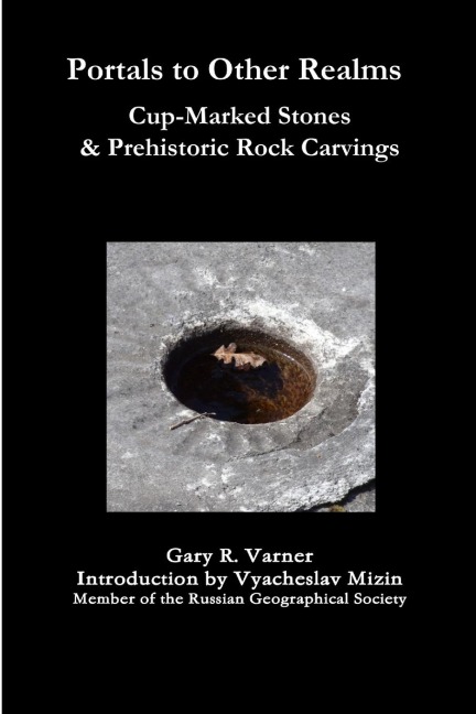 Portals to Other Realms: Cup-Marked Stones and Prehistoric Rock Carvings