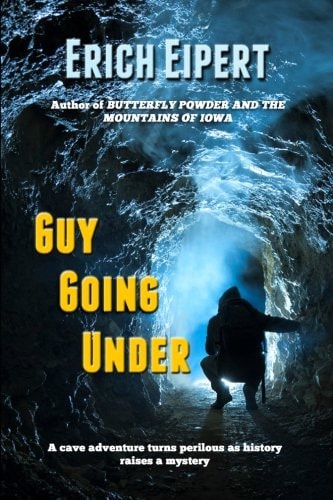 Guy Going Under A Cave Adventure
