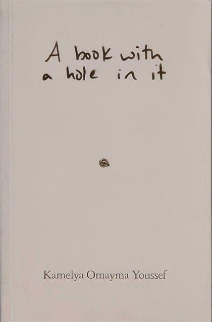 A book with a hole in it