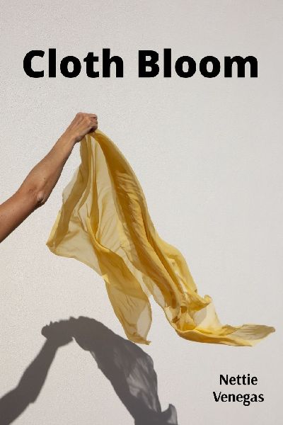 Cloth Bloom: Textile hues imbue cloth, displaying singular stitched expression.